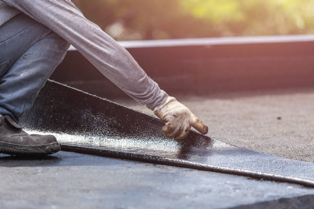 Professional Waterproofing technician working in Whitehall, MI